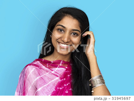 Indian girl smiling casual studio portrait 31945697