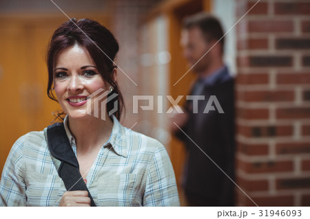 Mature student standing in the corridor Mature student standing in the corridor 31946093