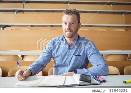 Mature student writing notes Mature student writing notes 31946221