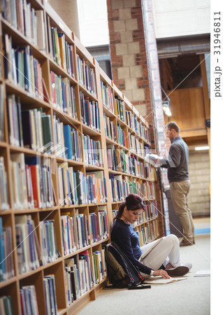 Mature student reading a book Mature student reading a book 31946811