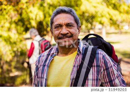 Portrait of man holding a backpack Portrait of man holding a backpack 31949203