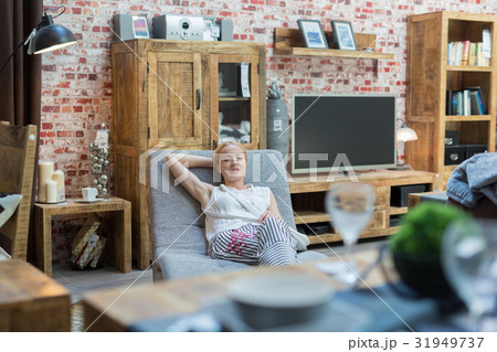 Woman shopping for furniture, sofa and home decor Woman shopping for furniture, sofa and home decor 31949737