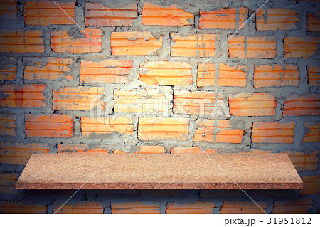 Empty top of natural stone shelves and stone wall  31951812