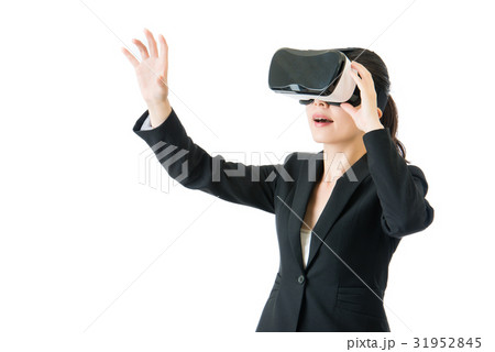 asian business woman touch screen by VR headset 31952845