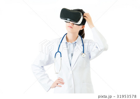 female doctor thinking with VR headset glasses 31953578