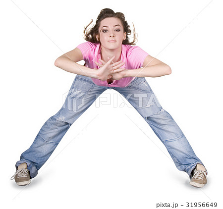Teenage girl dancing hip-hop over white 31956649