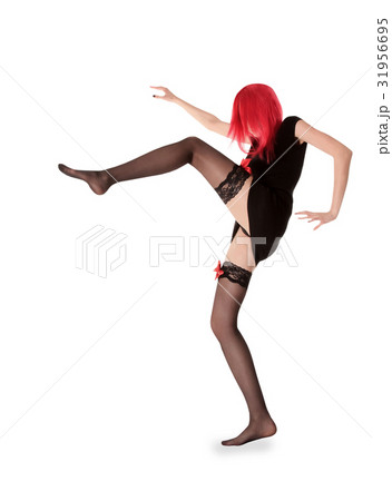 red hair woman in black stockings posing red hair woman in black stockings posing 31956695