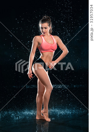 Young tanned fit woman with beautiful sporty Young tanned fit woman with beautiful sporty 31957034