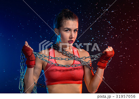 Young tanned fit woman with beautiful sporty 31957056