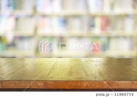 Empty table top on library blurred background Empty table top on library blurred background 31960759