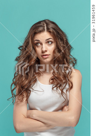 Portrait of young woman with shocked facial Portrait of young woman with shocked facial 31961459