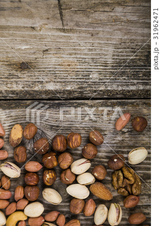 Different kinds of  nuts. 31962471