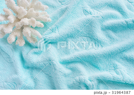 White coral on the terry orange towel 31964387