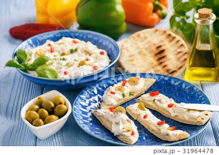 Feta cheese spread with olives and pepper. Feta cheese spread with olives and pepper. 31964478