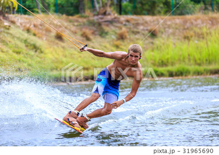 Man Wakeboarding 31965690