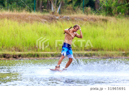 Man Wakeboarding Man Wakeboarding 31965691
