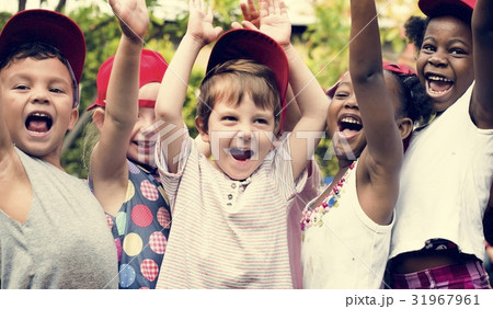 Group of Diverse Kids Hands Raising Up Cheerfully Together Group of Diverse Kids Hands Raising Up Cheerfully Together 31967961