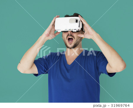 A man using a visualiaing reality gadget 31969764