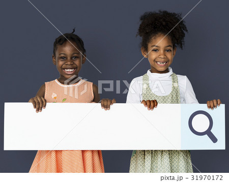 Little girl smiling and holding blank search placard Little girl smiling and holding blank search placard 31970172