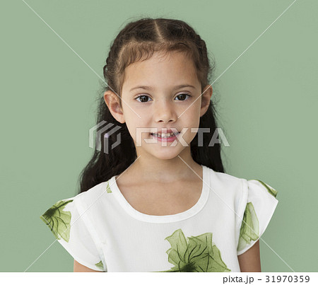 Young little girl with awkward smile expression portrait 31970359