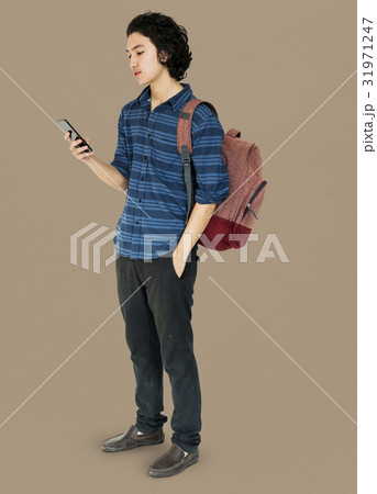 Young man full body using smart phone Young man full body using smart phone 31971247