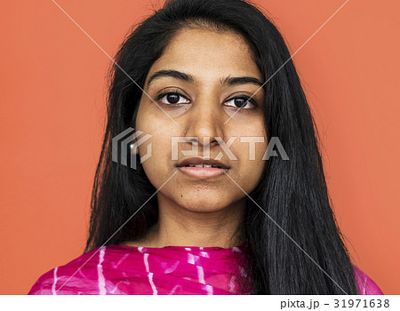 Young woman thinking studio portrait 31971638