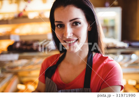 Portrait of female baker smiling 31971990
