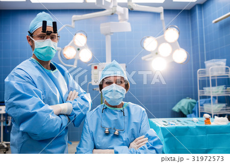Portrait of surgeons in operation room 31972573