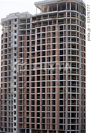 Facade and round corner of a modern concrete Facade and round corner of a modern concrete 31976777