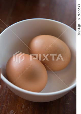 Eggs in a cup 31977234