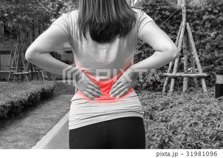 Female athlete lower back painful injury 31981096