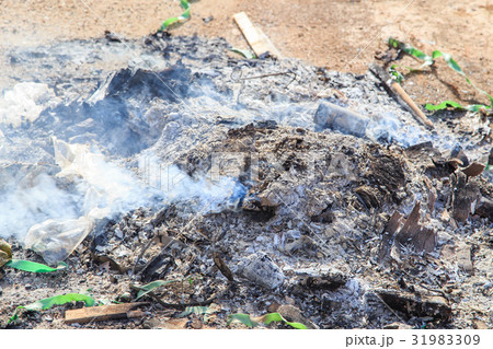 burning garbage with white smoke burning garbage with white smoke 31983309