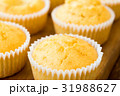 Mini vanilla muffins on the brown table 31988627