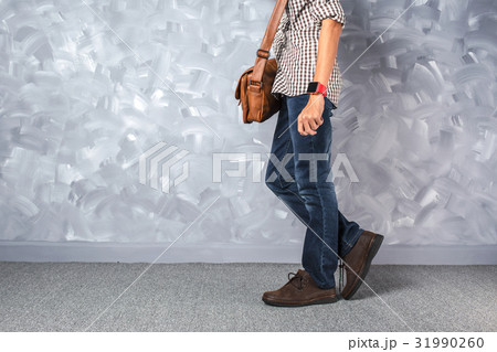 Vintage travelling men fashion with leather bag 31990260