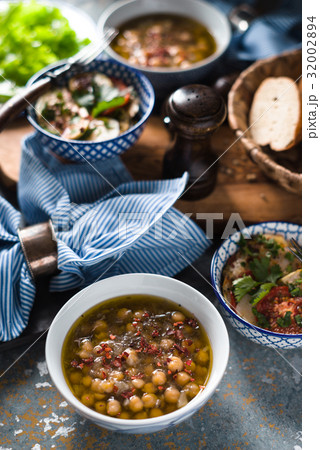 Dinner in the Greek style on the stone background Dinner in the Greek style on the stone background 32002894