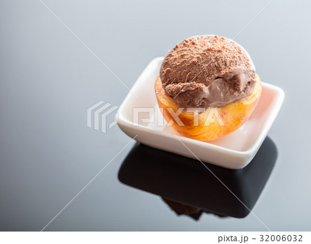 Dessert ice cream on peach 32006032