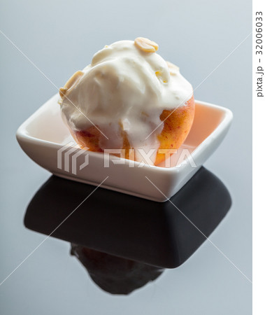 Dessert ice cream on peach 32006033