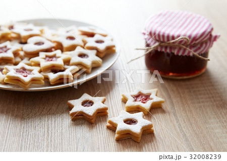 Christmas Linzer cookies on the table 32008239