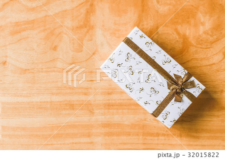 Top view of Gift box on wooden table background Top view of Gift box on wooden table background 32015822