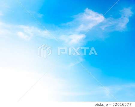 Blue sky background with white clouds and sunlight 32016377