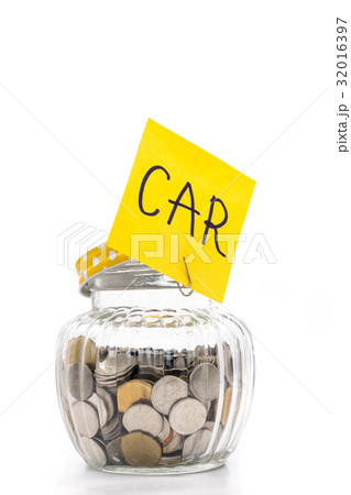 Coins in glass bottle, saving money for Car 32016397