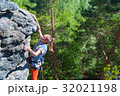 Rock climber girl.  32021198