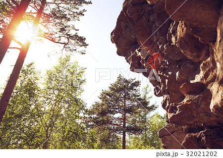 Rock climber girl. Young girl extreme climber Rock climber girl. Young girl extreme climber 32021202
