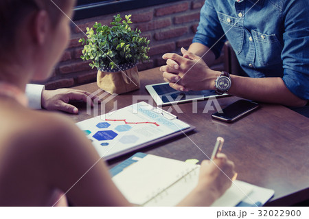 Business people discussing a financial plan Business people discussing a financial plan 32022900