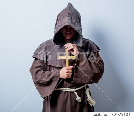 Portrait of Young catholic monk with cross 32025181