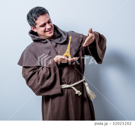 catholic monk with Eiffel tower gift 32025202