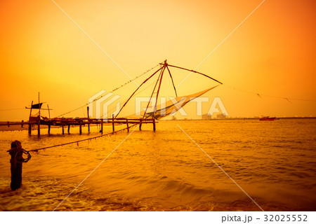 beautiful sunset scene of Kochi chinese fishnets beautiful sunset scene of Kochi chinese fishnets 32025552
