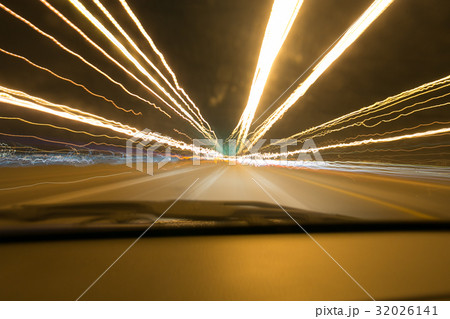 Street lights in speeding car in night time, 32026141