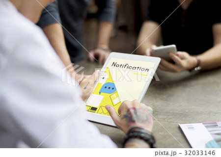People working on digital device network graphic overlay 32033146