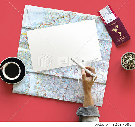 Hand holding toy airplane and planning travel destination Hand holding toy airplane and planning travel destination 32037986